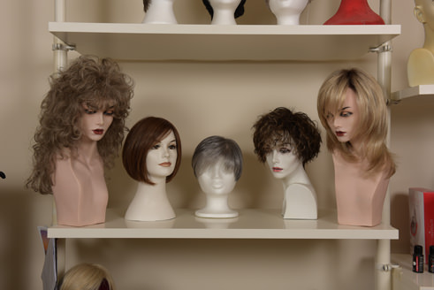 Variety of Wigs On Shelf